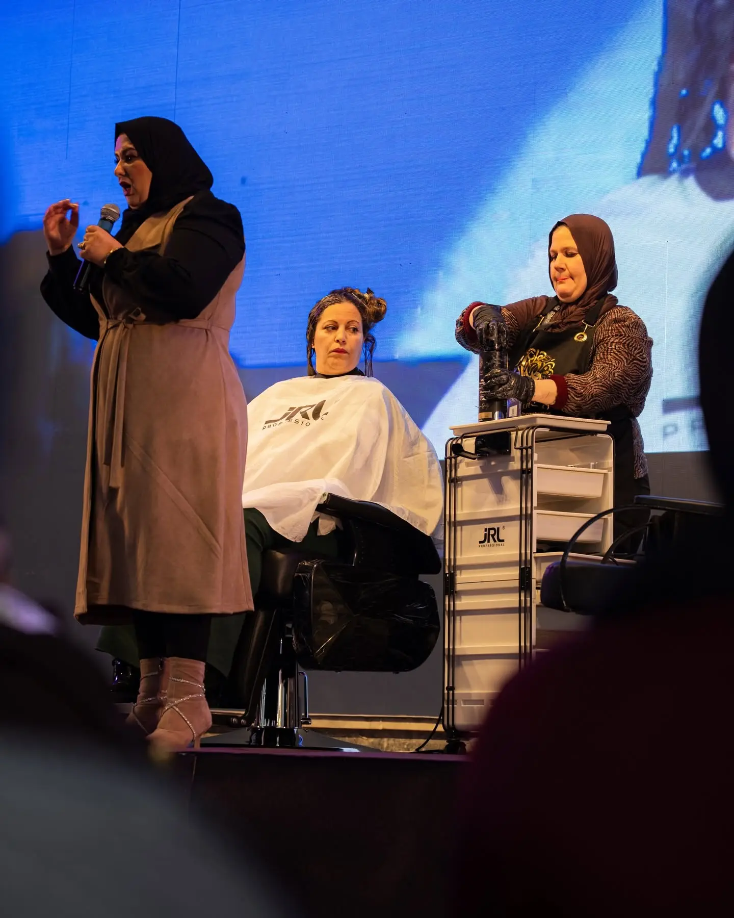 A hairdressing demonstration on the Cosmetica Show stage