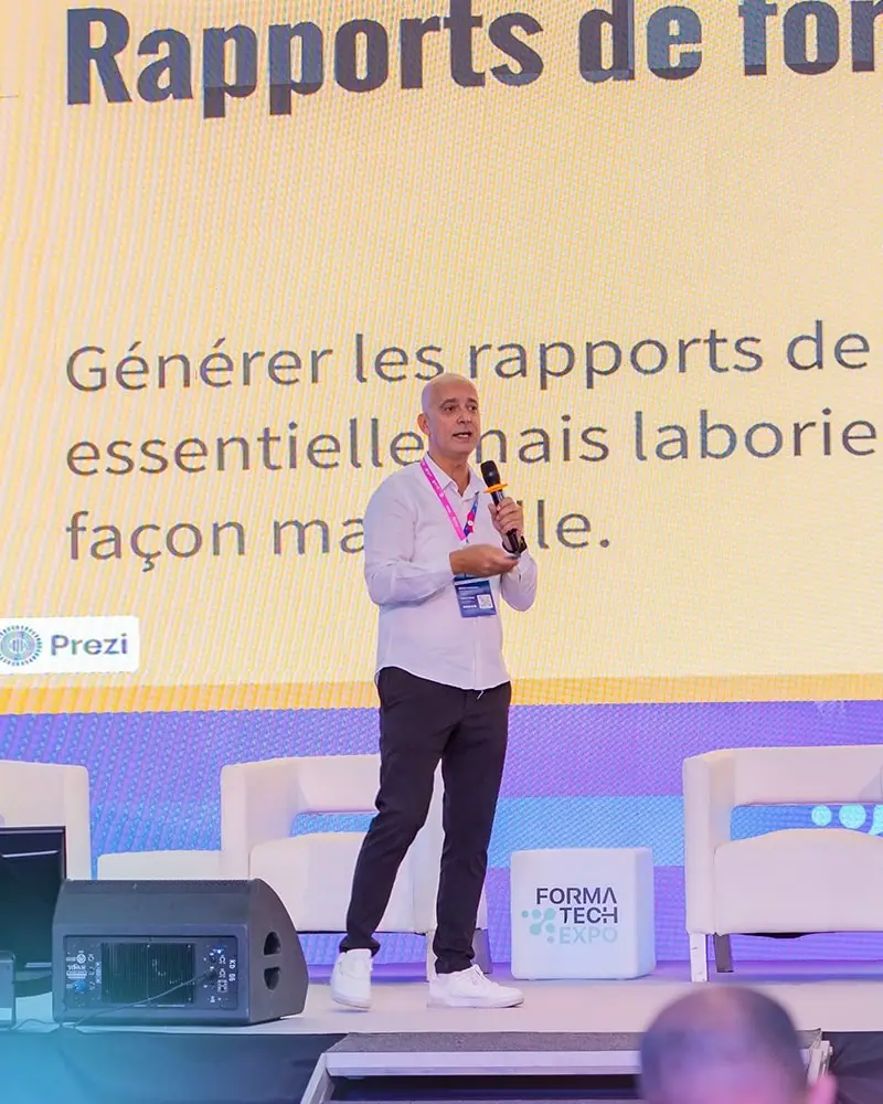 A speaker presenting on the FormaTech Expo 2025 stage