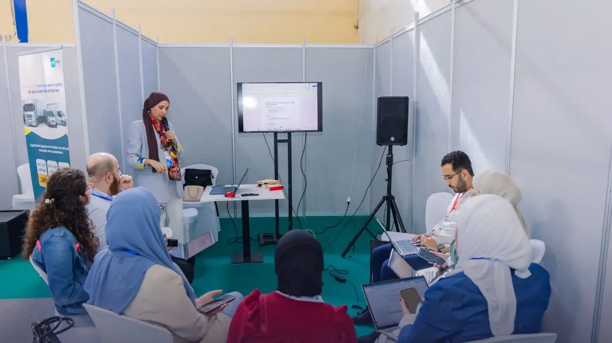 A workshop in one of the show’s rooms, laptops open